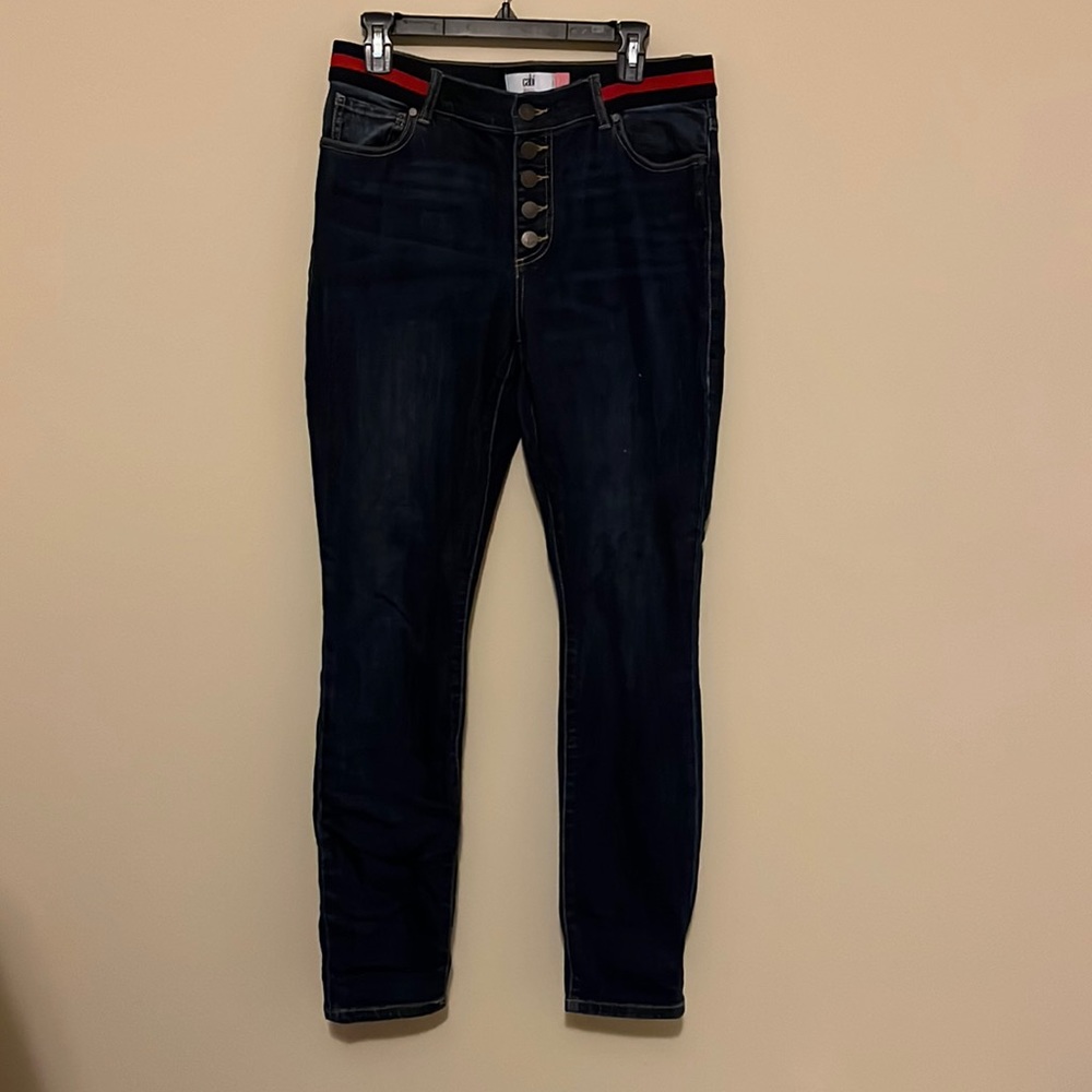 Size 10 dark wash Cabi jeans with button fly and blue and red belt detail